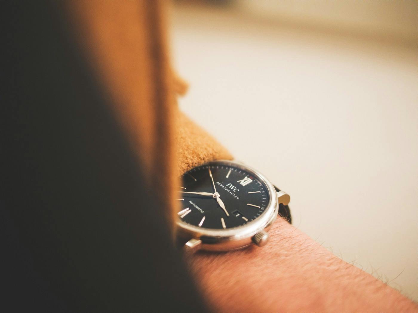 a watch on someone's wrist
