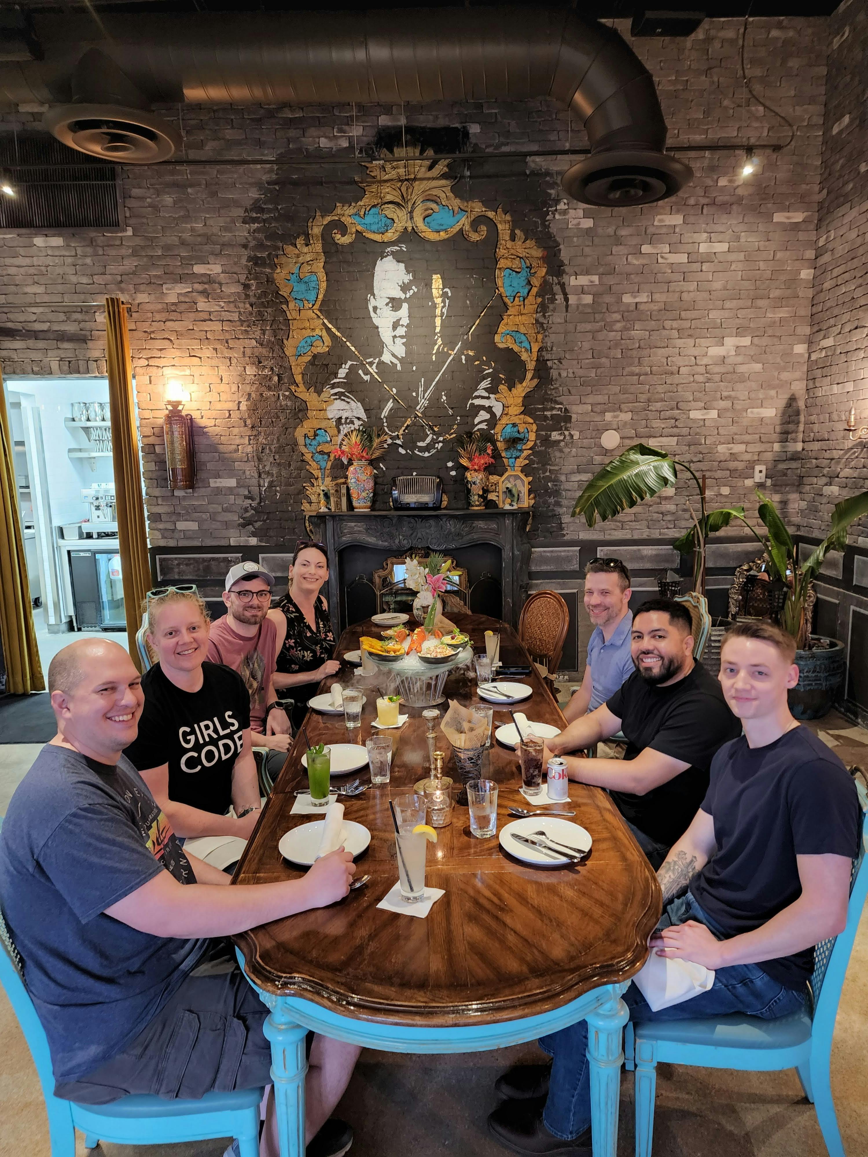 photo of the echobind team at dinner after React Miami